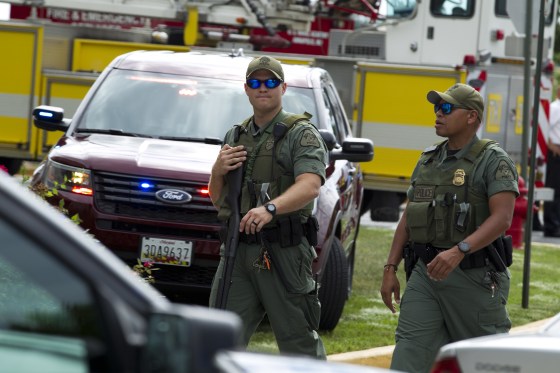 Image: Maryland police officers patrol the area after multiple people were shot at The Capital Gazette newspaper in Annapolis