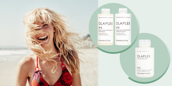 Portrait of cheerful woman on beach with bleach blond hair and three different Olaplex products. Hair restoration, healing and hydration is key for bleached hair. Olaplex, Ouai, Verb Purple and Moroccanoil products can help heal hair after bleaching.