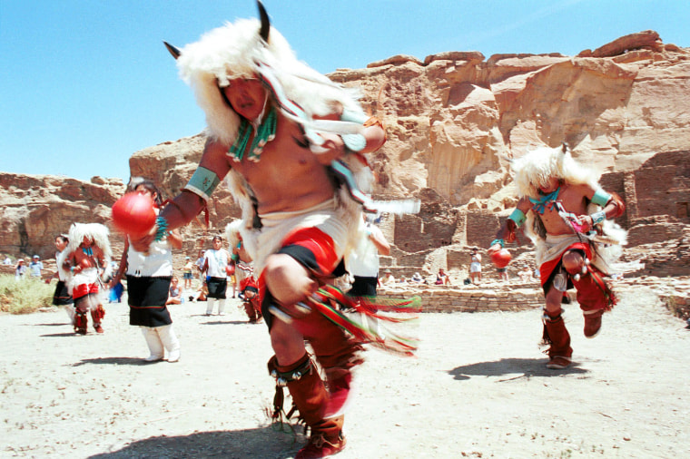 Dancers from Zuni Pueblo, N.M., perform the White Buffalo Dance  during summer solstice  celebrations in the plaza of Pueblo Bonito at Chaco Culture National Historical Park, N.M. on June 21, 2001. The event marked the first time in over 900 years that Puebloan dancers danced in the plaza of the Ancestral Puebloan ruin.