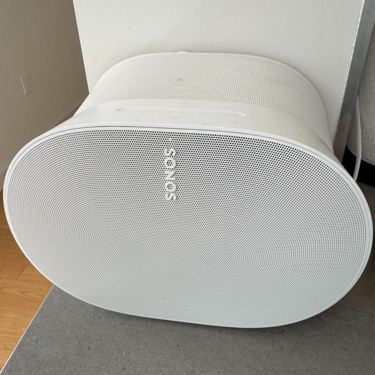 The Sonos Era 300 on top of a gray counter.