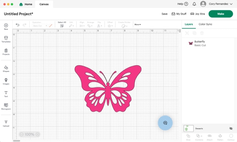 Screenshot of the canvas in the Cricut Design Space with a design of a pink butterfly on the grid.