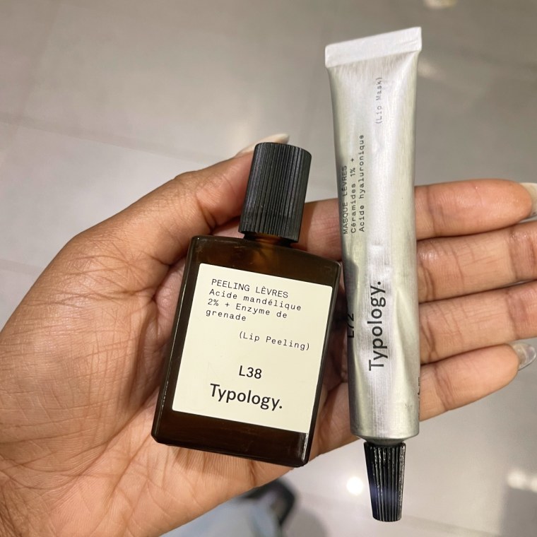 A hand holding the lip duo.