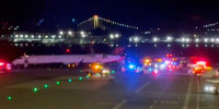 Emergency response at LaGuardia Airport after Delta plane collision, Oct. 1, 2025
