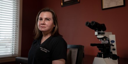 Allison Brown, a dermatologist and dermatopathologist, in her home office in Novi, Mich.