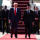U.S. President Donald Trump is greeted by Malaysian Prime Minister Anwar Ibrahim as he arrives at Kuala Lumpur International Airport on October 26, 2025 in Kuala Lumpur, Malaysia.
